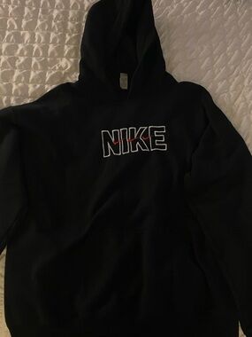 Embroided Nike Black Hoodie with White-Outlined Logo and Red Accent